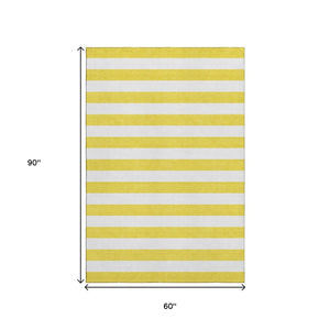 HomeRoots 5' X 8' Yellow and Ivory Striped Area Rug - Washable, UV Protected, Perfect for Family Spaces! 647676