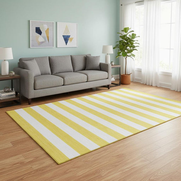 HomeRoots 5' X 8' Yellow and Ivory Striped Area Rug - Washable, UV Protected, Perfect for Family Spaces! 647676