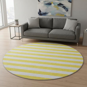 HomeRoots 8' Washable Round Rug in Yellow and Ivory Stripes - UV Protected, Durable, and Easy-Care Design! 647677