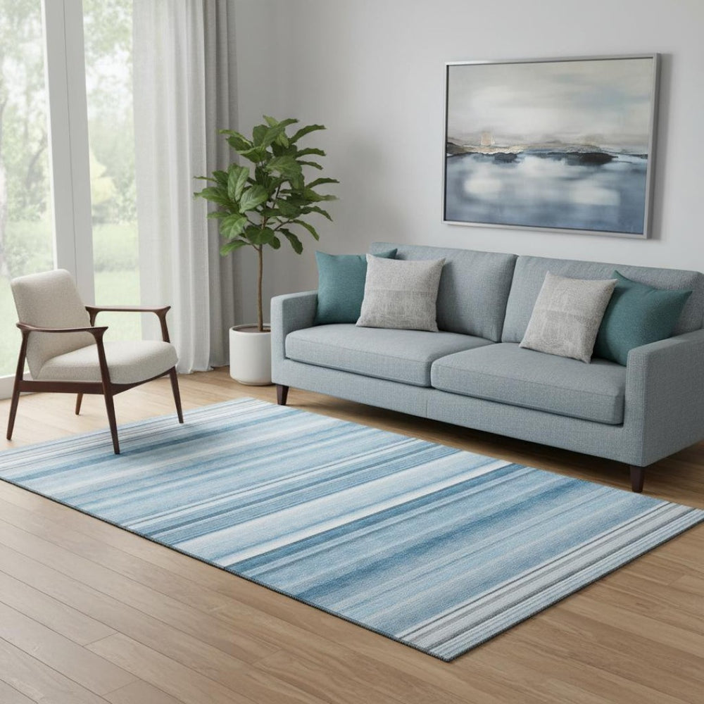 HomeRoots 5' X 8' Washable Blue and Ivory Striped Area Rug with UV Protection for Stylish, Durable Living Spaces 647694