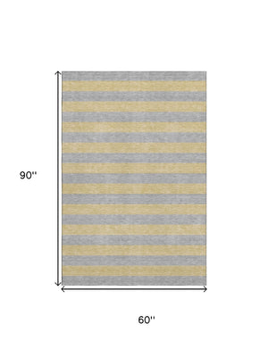 HomeRoots 5' X 8' Elegant Silver and Gold Striped Washable Area Rug with UV Protection for All Spaces 647766