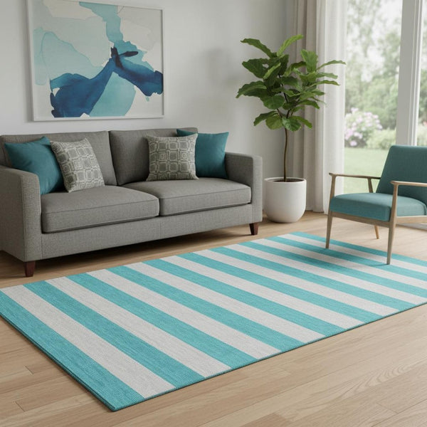 HomeRoots 5' X 8' Turquoise and Ivory Striped Washable Area Rug – Durable, UV-Protected, Coastal Home Decor 647778