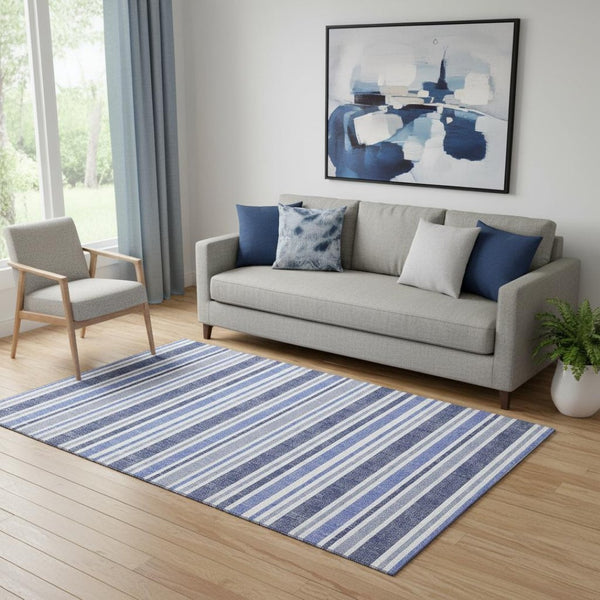 HomeRoots 5' X 8' Stylish Blue and Ivory Striped Washable Area Rug with UV Protection for Busy Homes 647784