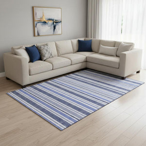 HomeRoots 9' X 12' Striped Blue and Ivory Washable Area Rug with UV Protection for Homes with Kids & Pets 647787