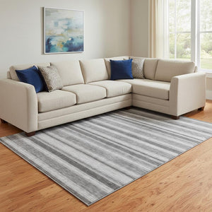 HomeRoots 9' X 12' Stylish Silver and Gray Striped Washable Area Rug with UV Protection for High-Traffic Areas 647871