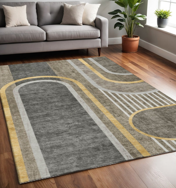 HomeRoots 5' X 8' Taupe and Gold Geometric Area Rug - Washable, UV-Protected, and Stain-Resistant Design 647928