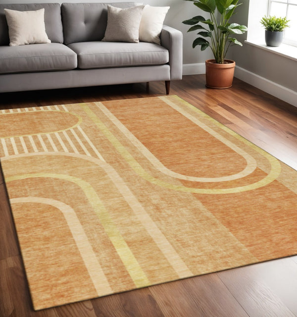 HomeRoots 5' X 8' Terra Cotta and Gold Geometric Washable Area Rug - UV Protected, Stain Resistant for Kids & Pets 647940
