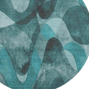 HomeRoots 8' Teal and Ivory Abstract Round Rug - Washable, UV Protected, Stylish, Durable for High-Traffic Areas 648103