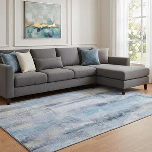 HomeRoots 9' X 12' Blue And Ivory Abstract Washable Area Rug – Stylish, Durable, UV-Protected for High Traffic Spaces 648117