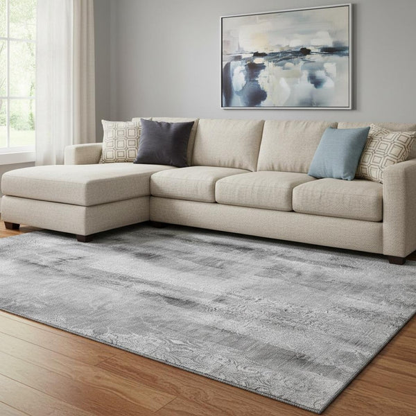 HomeRoots 10' X 14' Gray and Ivory Abstract Area Rug - Durable, Washable, UV Protected for Modern Spaces 648124