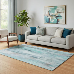 HomeRoots 5' X 8' Teal And Ivory Abstract Area Rug - Washable, UV-Protected, Durable Design for Modern Homes 648144