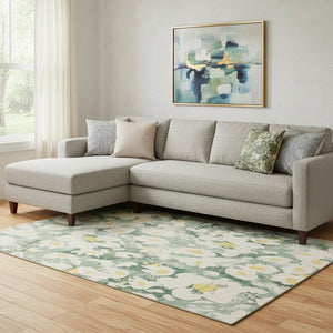 HomeRoots 9' X 12' Floral Area Rug in Green, Yellow, & Ivory – Washable, UV Protected, and Stain Resistant Design 648165