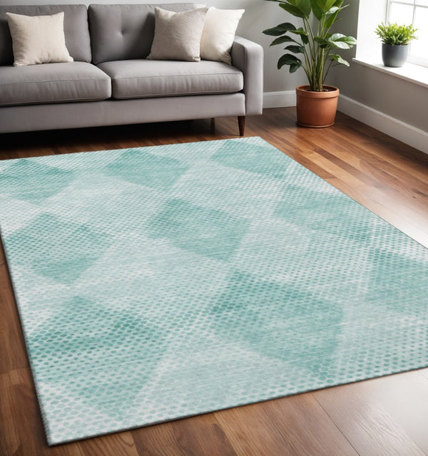 HomeRoots 5' X 8' Stylish Teal & Ivory Geometric Washable Area Rug with UV Protection for Modern Homes 648216