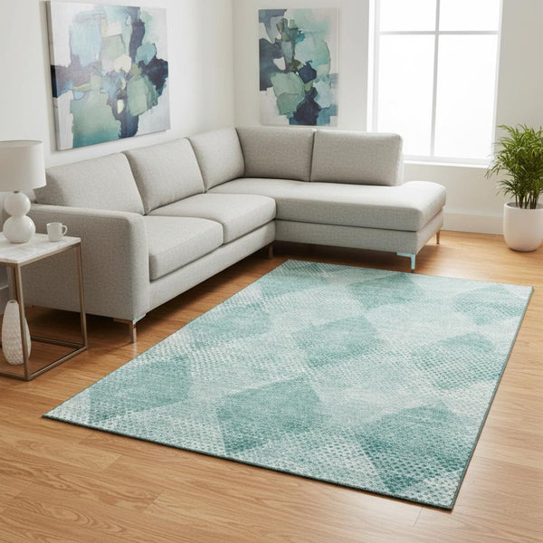 HomeRoots 9' X 12' Teal and Ivory Geometric Area Rug – Washable, UV-Protected, Perfect for Modern Homes! 648219