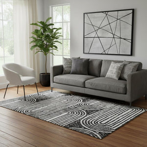 HomeRoots 5' X 8' Stylish Black And Ivory Geometric Area Rug - Washable, UV-Protected, Ideal For Homes 648222