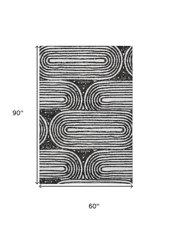 HomeRoots 5' X 8' Stylish Black And Ivory Geometric Area Rug - Washable, UV-Protected, Ideal For Homes 648222