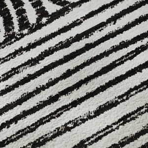 HomeRoots 8' Black And Ivory Geometric Round Rug - Washable, UV-Protected, Modern Design for High-Traffic Areas 648223