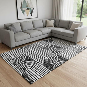 HomeRoots 8' X 10' Black And Ivory Geometric Washable Area Rug - Durable, Stylish, UV-Protected for Any Space 648224