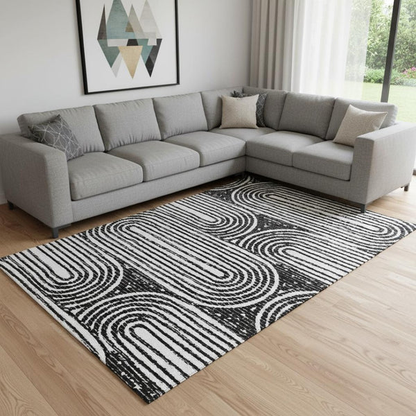 HomeRoots 8' X 10' Black And Ivory Geometric Washable Area Rug - Durable, Stylish, UV-Protected for Any Space 648224