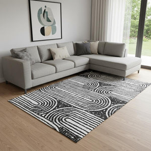 HomeRoots 9' X 12' Black And Ivory Geometric Washable Area Rug - Durable, UV-Protected, Modern Style Accent Piece 648225