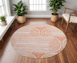 HomeRoots 8' Salmon and Ivory Geometric Washable Round Rug with UV Protection for Stylish, Durable Living Spaces 648259
