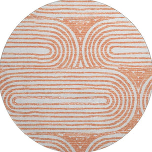 HomeRoots 8' Salmon and Ivory Geometric Washable Round Rug with UV Protection for Stylish, Durable Living Spaces 648259