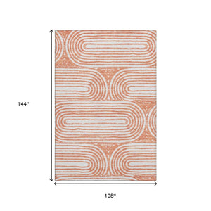 HomeRoots 9' X 12' Salmon and Ivory Geometric Area Rug - Washable, UV-Protected, Durable for Modern Living Spaces 648261