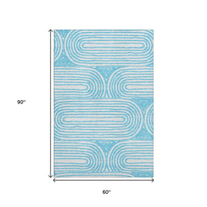 HomeRoots 5' X 8' Teal and Ivory Geometric Area Rug - Stylish, Washable, UV-Protected, Durable for High-Traffic Areas 648264