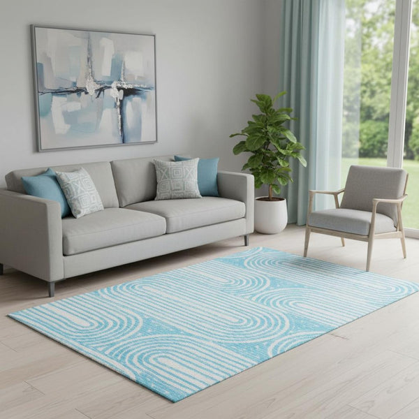 HomeRoots 5' X 8' Teal and Ivory Geometric Area Rug - Stylish, Washable, UV-Protected, Durable for High-Traffic Areas 648264