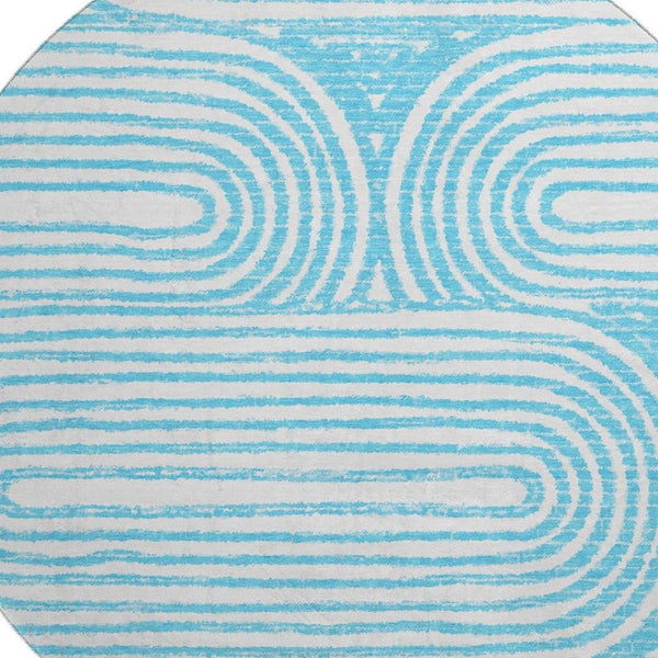 HomeRoots 8' Teal And Ivory Geometric Round Rug - Washable, UV Protected, Stylish Design for High-Traffic Areas 648265