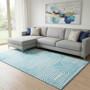 HomeRoots 10' Teal and Ivory Geometric Area Rug - Washable, UV Protected, Durable for Modern Living Spaces 648268