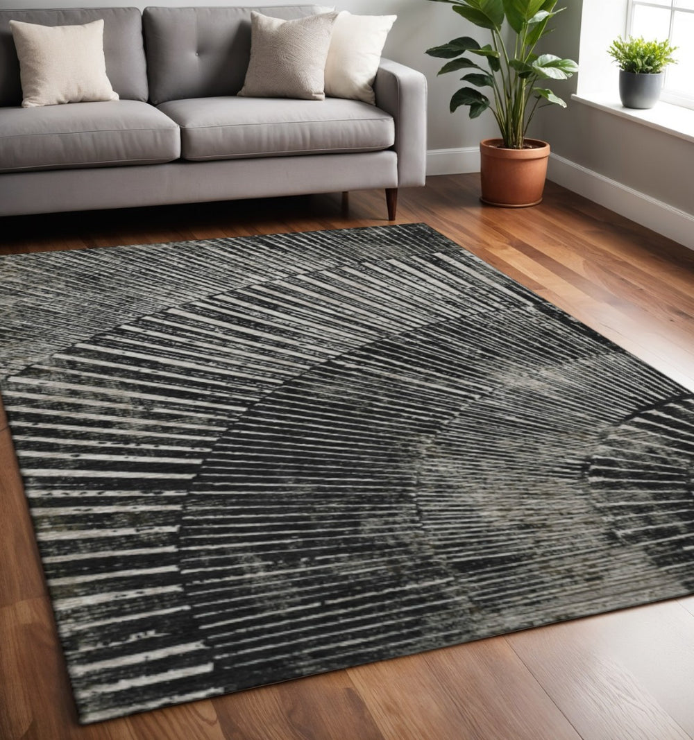 HomeRoots 5' X 8' Black and Ivory Geometric Washable Area Rug - Stylish, Durable, UV-Protected for Every Room! 648318