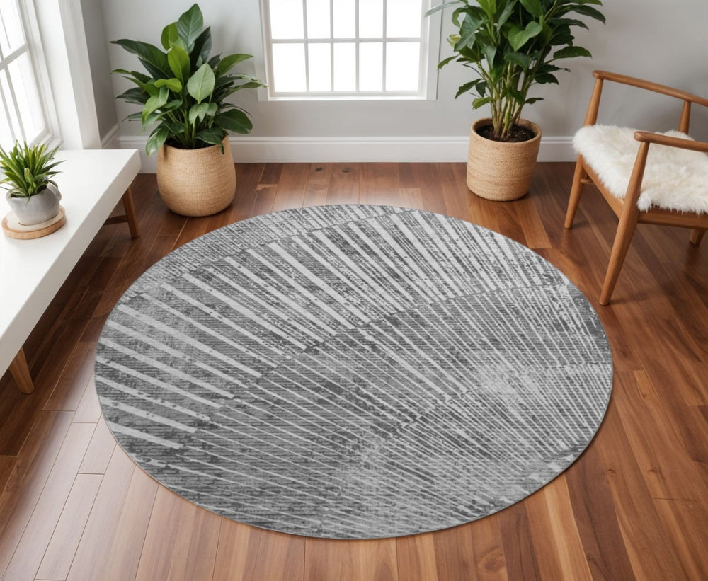 HomeRoots 8' Gray And Ivory Geometric Round Rug - Washable, UV Protected, Perfect for Busy Homes & Modern Decor 648331