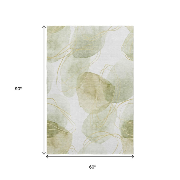 HomeRoots 5' X 8' Washable Green Gold Ivory Abstract Area Rug with UV Protection for Modern Living Spaces 648420
