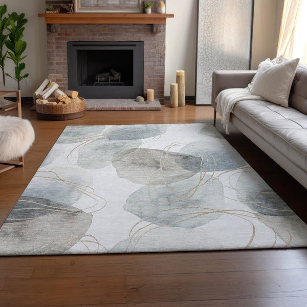 HomeRoots 10' X 14' Ivory and Beige Abstract Washable Area Rug - Durable, UV-Protected, Family-Friendly Design 648430