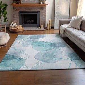 HomeRoots 5' X 8' Teal and Ivory Abstract Area Rug - Washable, UV-Protected, Durable Comfort for Busy Homes 648438