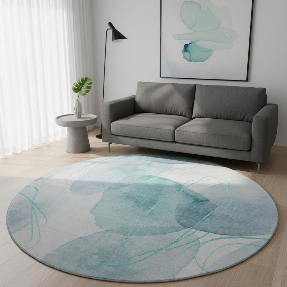 HomeRoots 8' Teal and Ivory Abstract Round Rug - Washable, UV-Protected, Stylish, and Durable for Any Room 648439