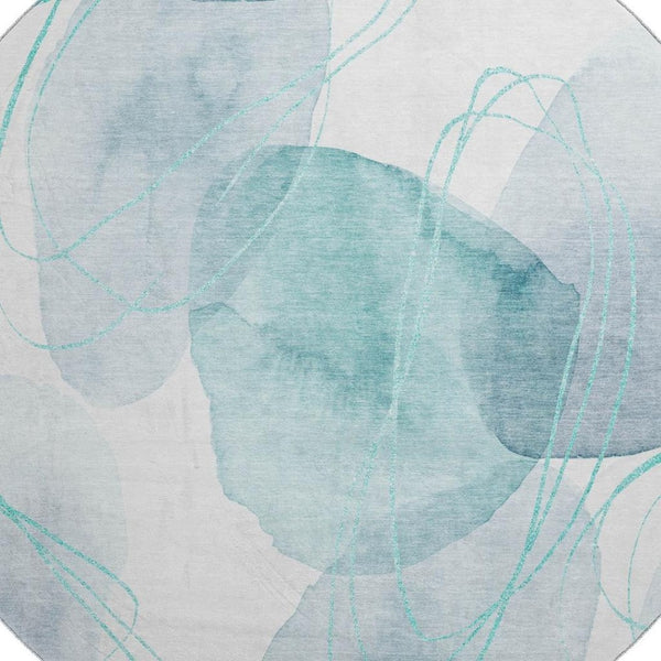 HomeRoots 8' Teal and Ivory Abstract Round Rug - Washable, UV-Protected, Stylish, and Durable for Any Room 648439
