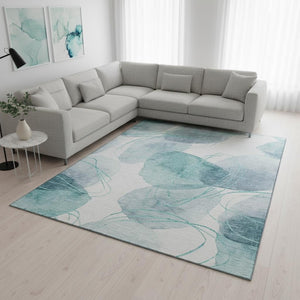 HomeRoots 9' X 12' Teal And Ivory Abstract Washable Area Rug - Stain Resistant, UV Protected for Modern Spaces 648441
