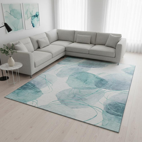 HomeRoots 9' X 12' Teal And Ivory Abstract Washable Area Rug - Stain Resistant, UV Protected for Modern Spaces 648441