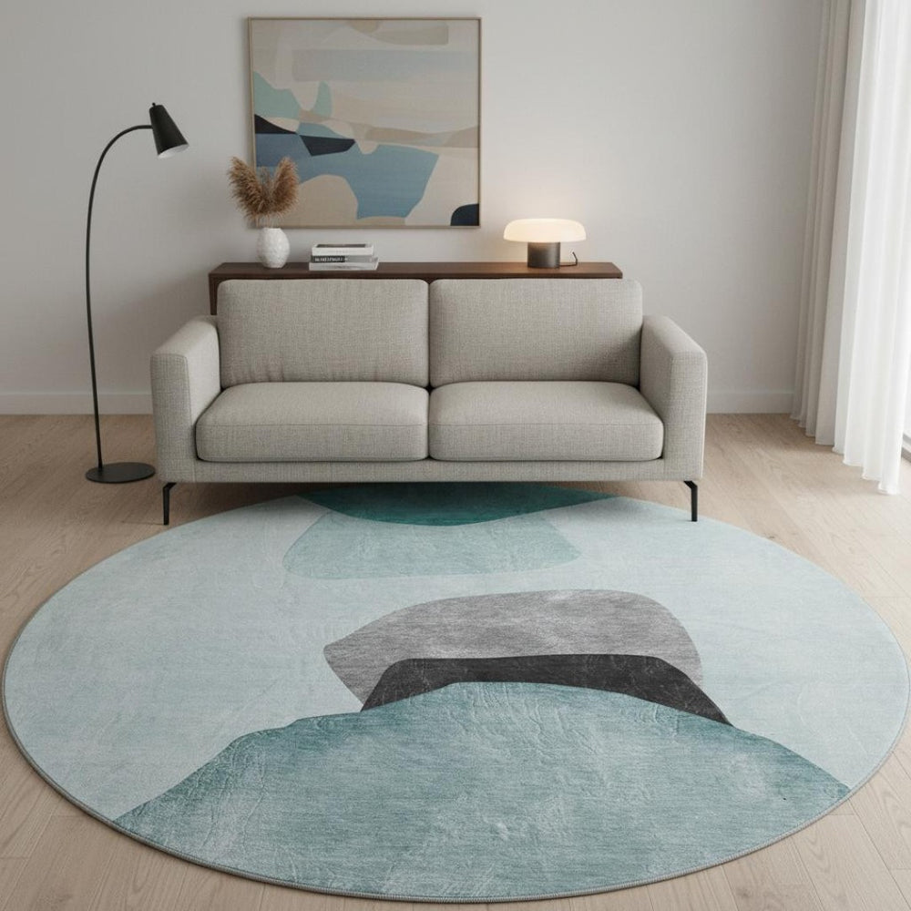 HomeRoots 8' Teal And Gray Abstract Round Rug - Washable, UV-Protected, Stain-Resistant for High-Traffic Areas 648487