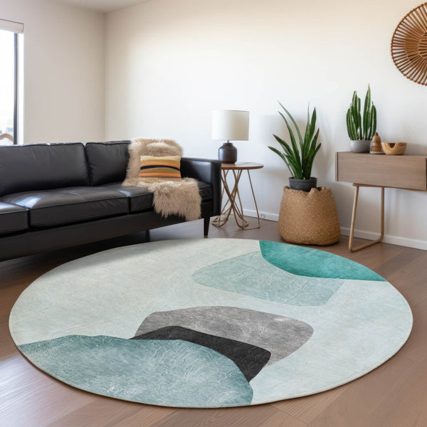 HomeRoots 8' Teal And Gray Abstract Round Rug - Washable, UV-Protected, Stain-Resistant for High-Traffic Areas 648487