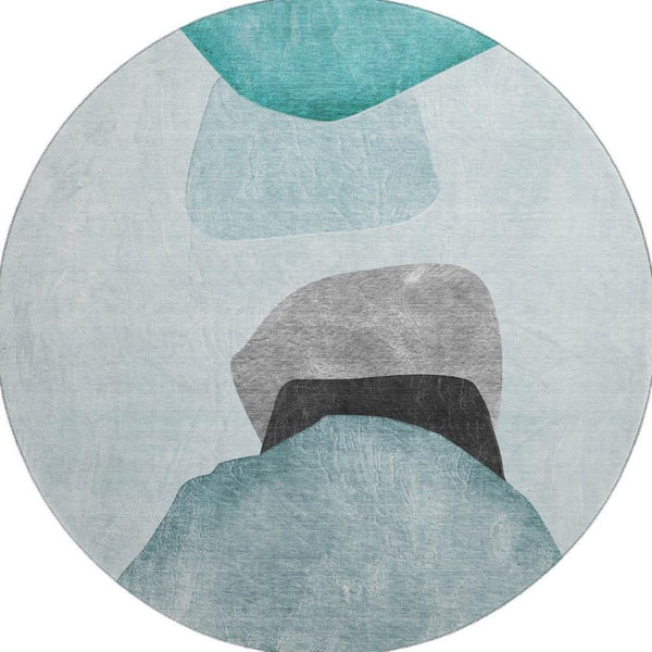 HomeRoots 8' Teal And Gray Abstract Round Rug - Washable, UV-Protected, Stain-Resistant for High-Traffic Areas 648487