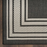 Nourison Horizon Indoor/Outdoor HOZ03 Machine Made Power-loomed Solid Border Indoor/Outdoor Modern Outdoor Rug Black, Black 88% Polypropylene,12% Polyester 841491128152