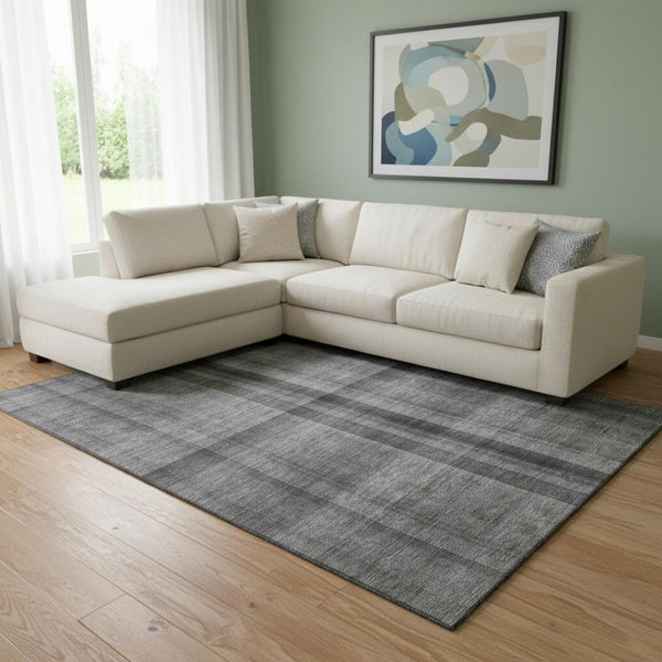 HomeRoots 9' X 12' Gray and Ivory Plaid Area Rug - Washable, UV Protected, Durable for High-Traffic Spaces 648501