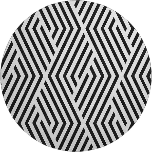 HomeRoots 8' Black And Ivory Geometric Round Rug - Durable, Washable, UV-Protected, Ideal For Modern Spaces 648517