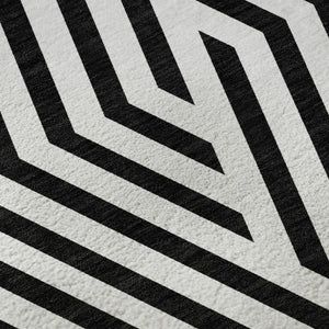 HomeRoots 8' Black And Ivory Geometric Round Rug - Durable, Washable, UV-Protected, Ideal For Modern Spaces 648517