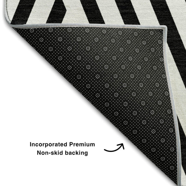 HomeRoots 8' X 10' Black and Ivory Geometric Area Rug - Washable, UV Protected, Durable for Everyday Use 648518