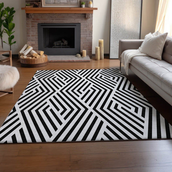 HomeRoots 8' X 10' Black and Ivory Geometric Area Rug - Washable, UV Protected, Durable for Everyday Use 648518