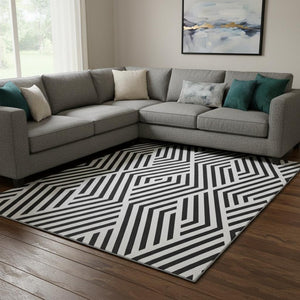HomeRoots 9' X 12' Black and Ivory Geometric Washable Area Rug - Stylish, Durable, UV-Protected for Homes 648519